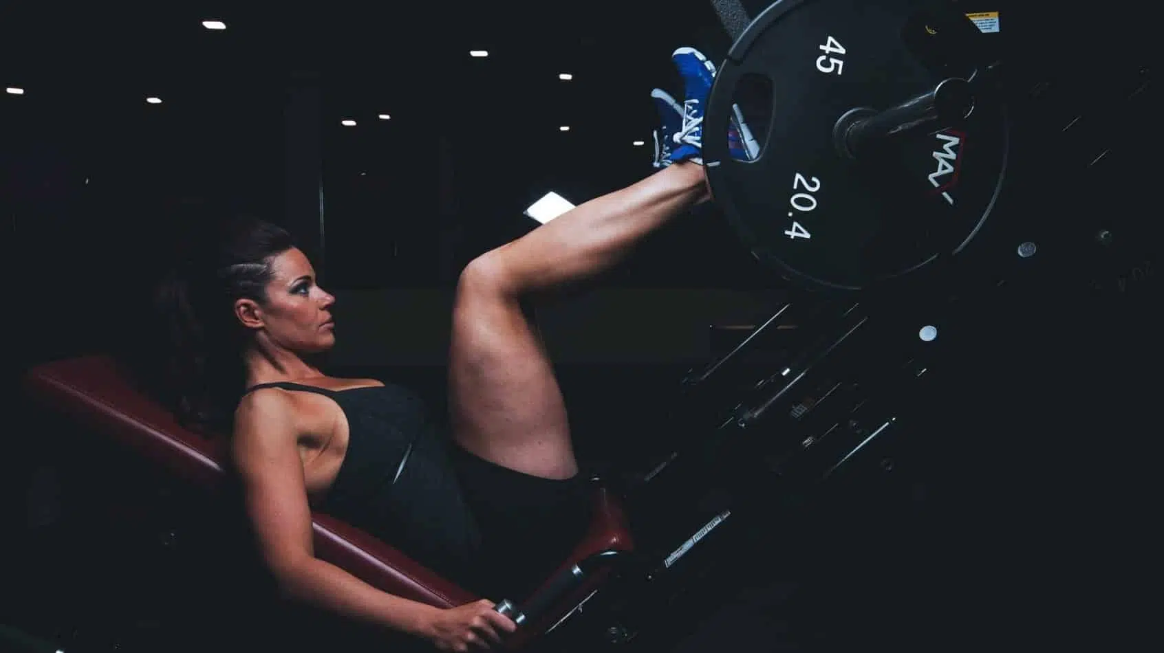 Top 21 Muscle Building Tips I Wish I Knew As A Beginner! (Updated 2021) 3 girl getting stronger on the leg press