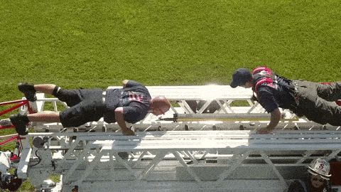 firefighters doing pushups