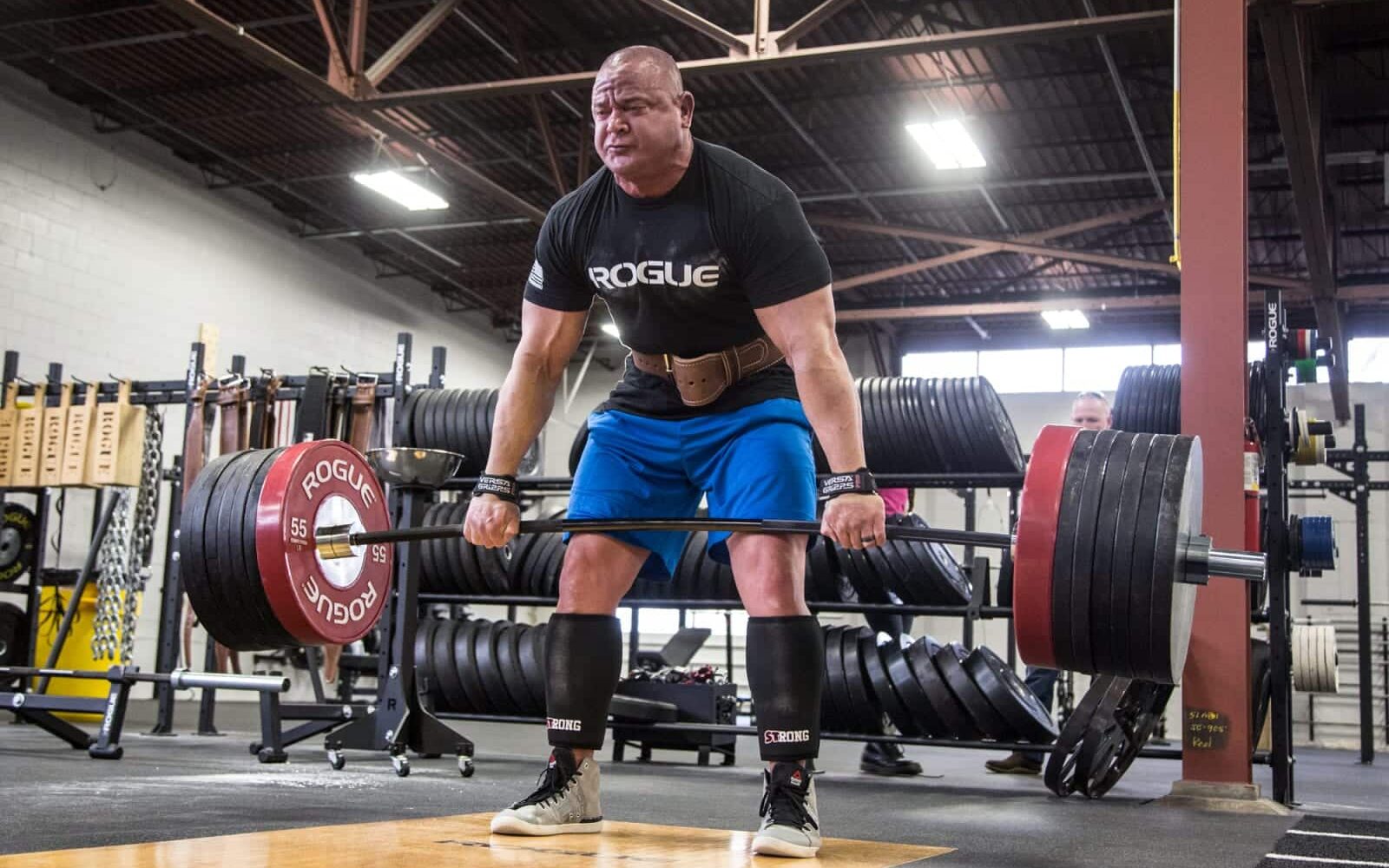 mark bell deadlifting with deadlift bar