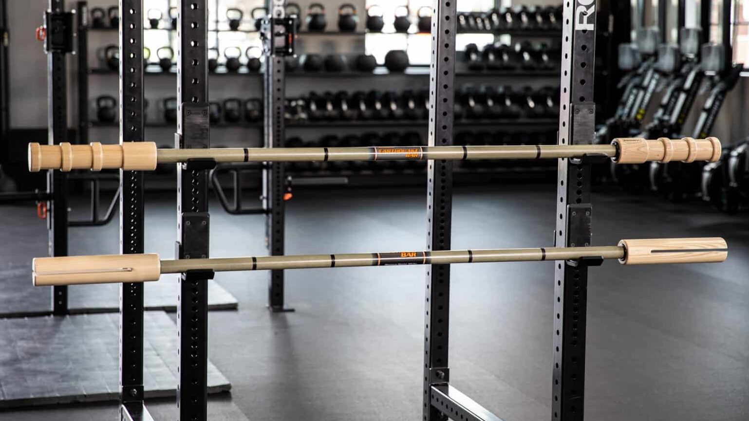 bamboo and earthquake bars racked in squat rack