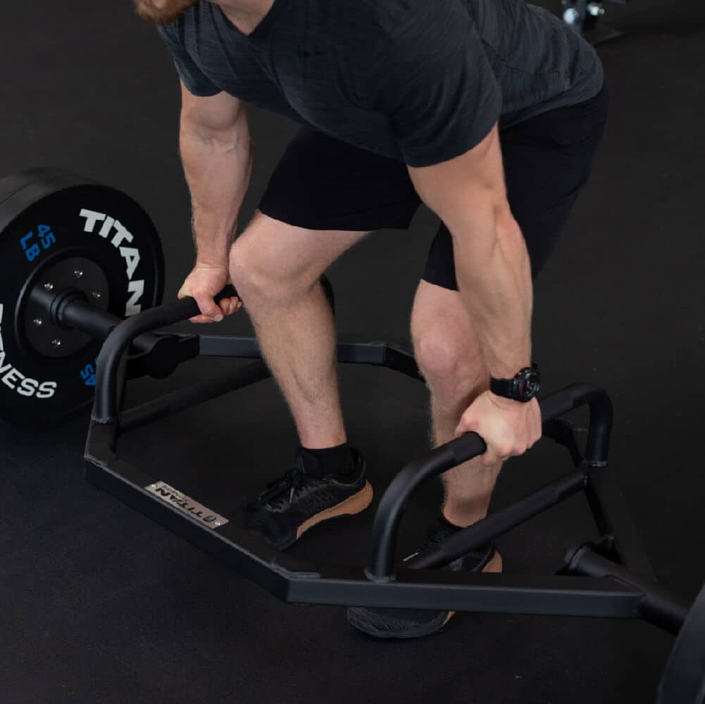 man about to deadlift with titan trap bar