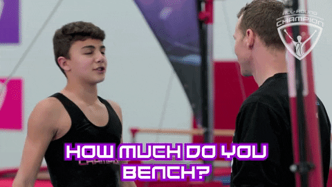 younger gymnast asking coach how much he benches
