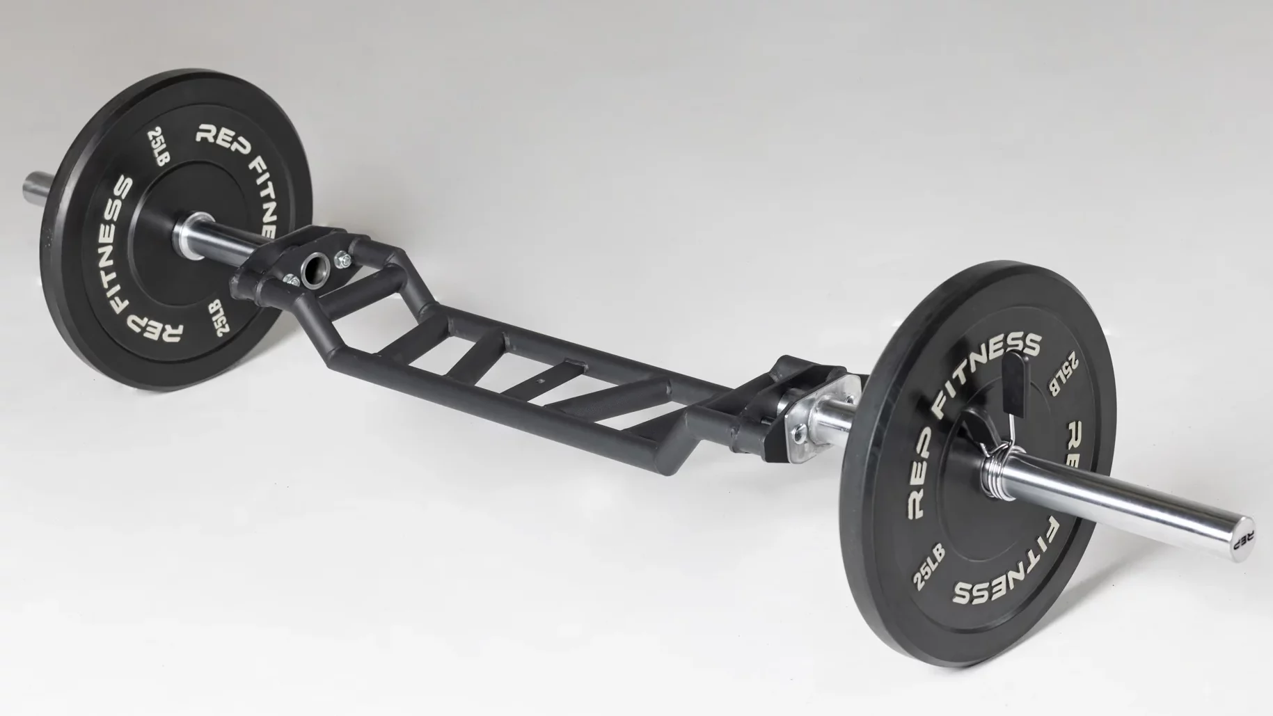 rep cambered bar with bumper plates loaded