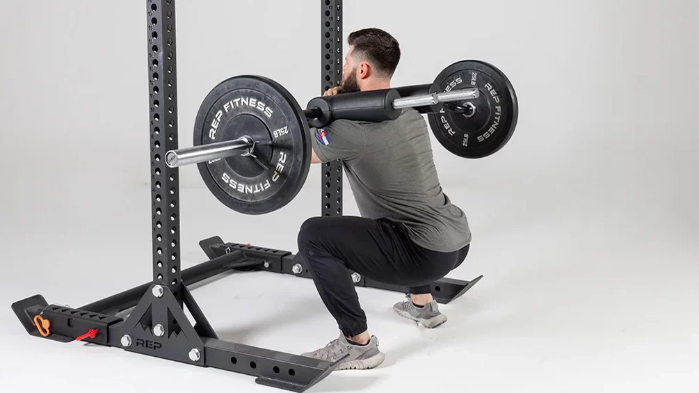 man doing safety bar squats